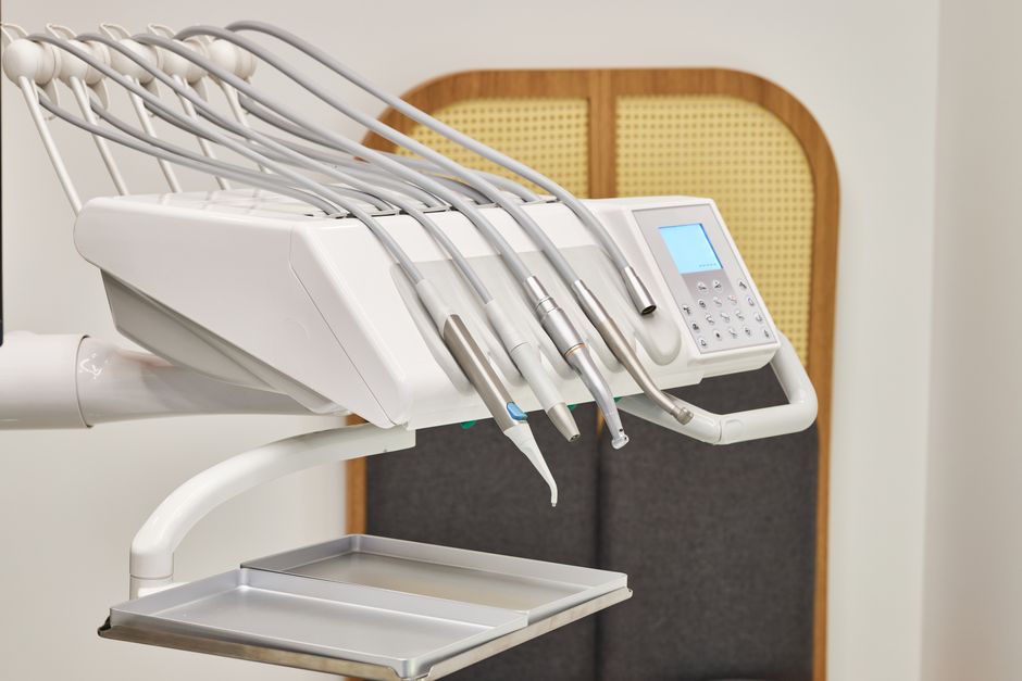 Sleek and modern dental equipment setup in a clinical environment, perfect for dentistry themes.