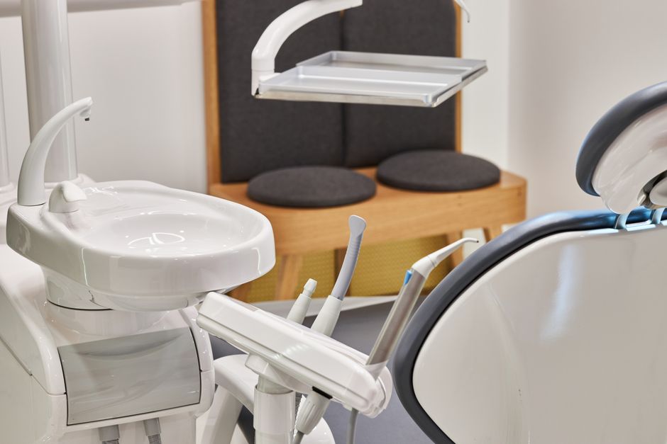 Bright and modern dental clinic with advanced equipment and comfortable seating area.