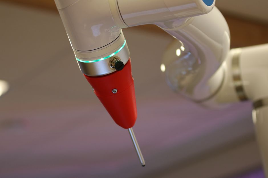 Detailed view of a cutting-edge industrial robotic arm in action.