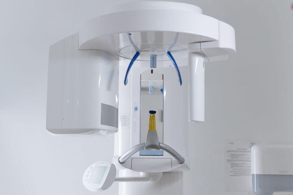Close-up of modern dental x-ray machine in a clinic setting.