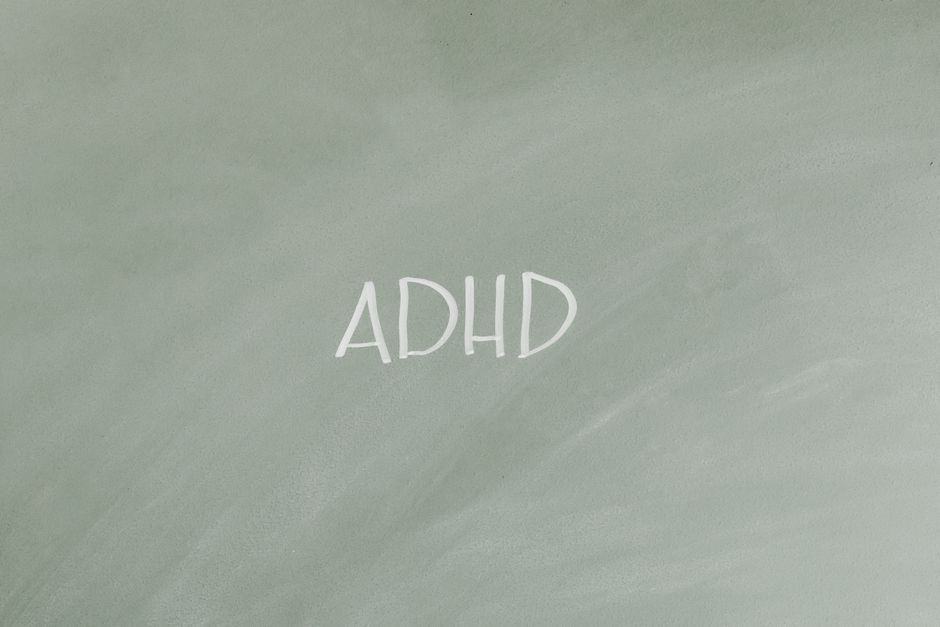 Simple illustration highlighting ADHD awareness with text on a gray background.