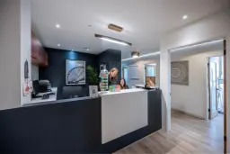 Spacious dental office reception with contemporary design in Beverly Hills.